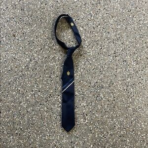 Navy Blue Tie with Gold Emblem